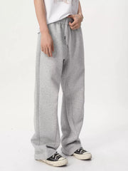 Relaxed fit sweatpants in Flower Gray with adjustable drawstring waist and wide leg.