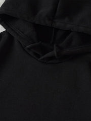 Black hoodie with adjustable drawstring hood and visible stitching detail.