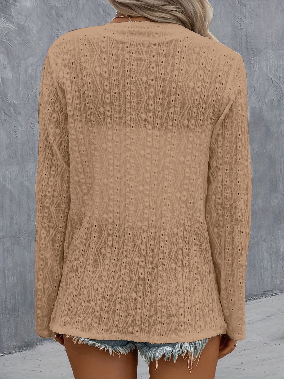 Camel open-weave long sleeve cardigan with intricate diamond pattern detail.