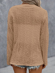 Camel open-weave long sleeve cardigan with intricate diamond pattern detail.