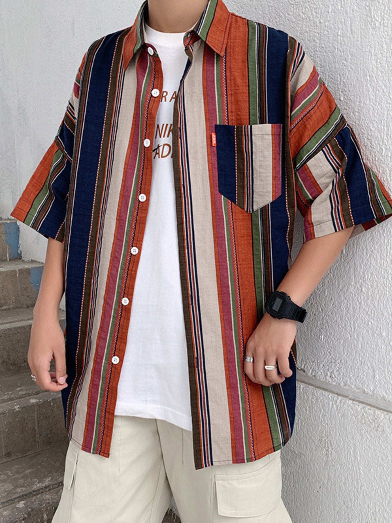 Men's striped half sleeve shirt in cotton blend with classic collar and button-down front.