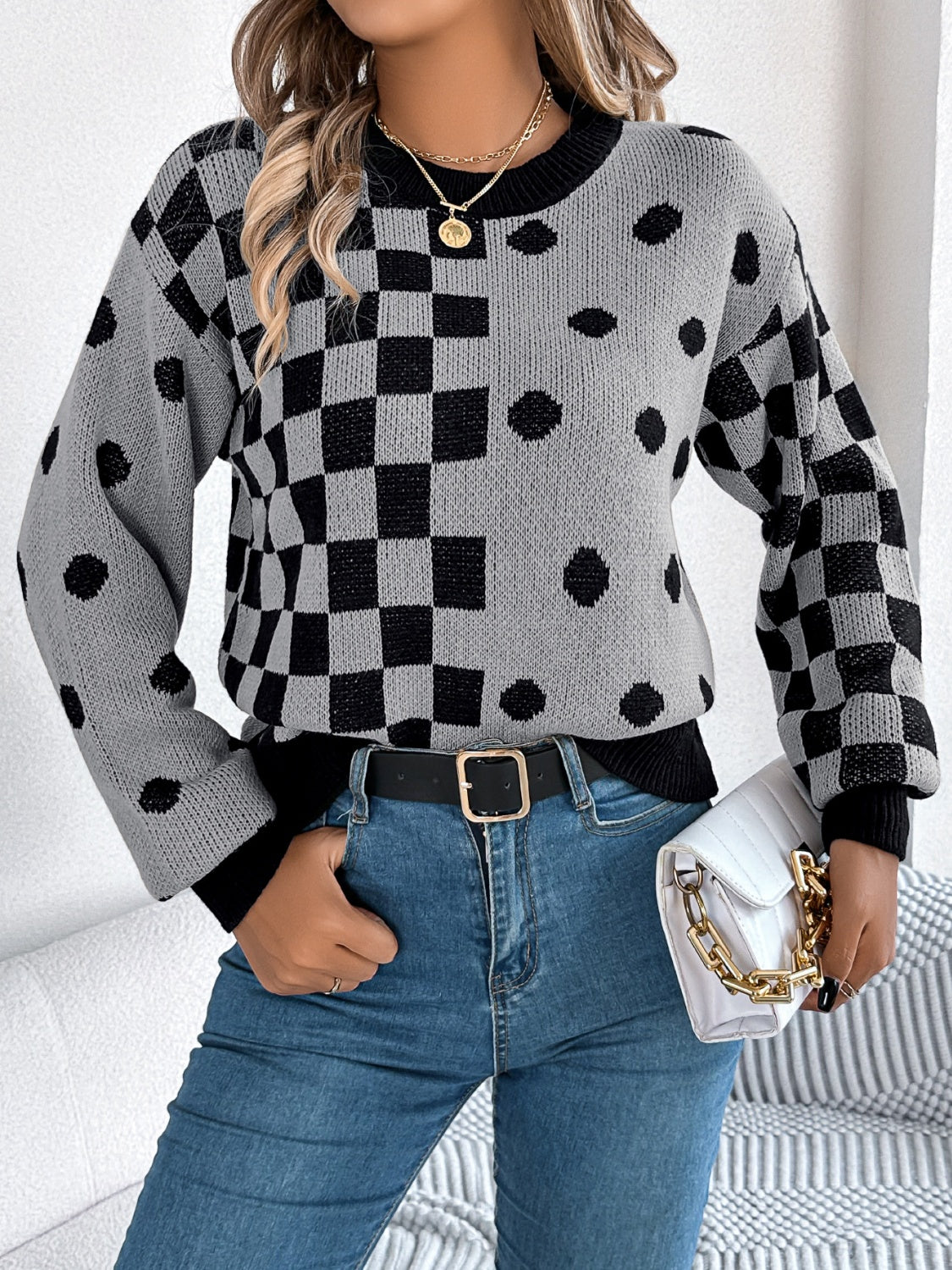 Gray acrylic sweater with checkerboard and dot intarsia pattern, crew neck, long sleeves.