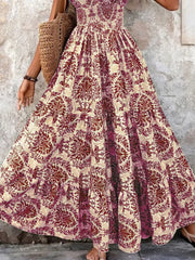 Maxi dress with smocked bodice and tiered skirt in a damask print.
