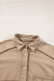 Tan waffle knit overshirt with collar, button front, and patch pocket detail.