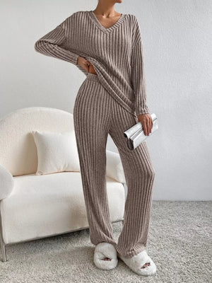 Brown ribbed knit V-neck loungewear set with long sleeves and wide-leg pants.