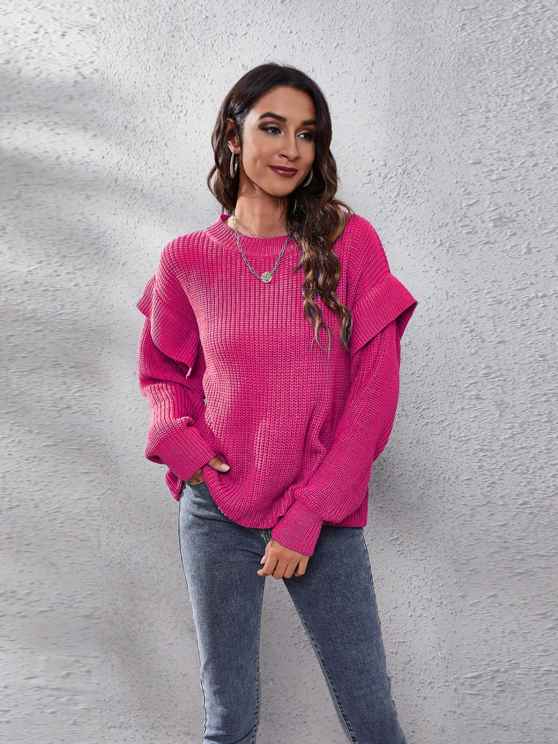 Cerise ruffled sleeve ribbed knit pullover sweater with crew neck.
