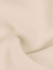 Apricot one-shoulder mini dress with bowknot detail.