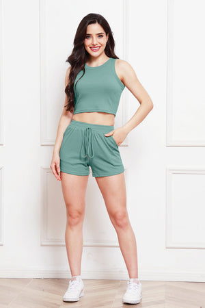 Teal ribbed tank top and drawstring shorts set with a cropped fit.