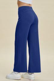 Blue wide leg lounge pants with a soft drape and high waist.