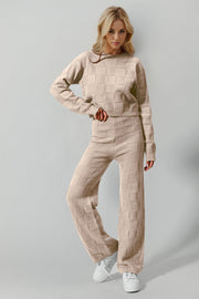 Tan textured knit square co-ord set with crew neck sweater and wide leg pants.