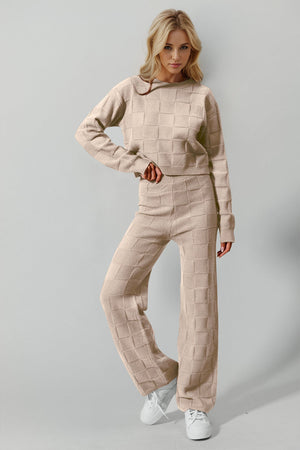 Tan textured knit square co-ord set with crew neck sweater and wide leg pants.