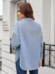 Light blue denim trucker jacket with button-down front and chest pockets.
