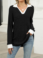 Black ribbed knit long sleeve t-shirt with white collar and cuffs, v-neck.