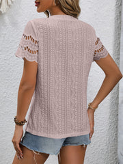 Pink blouse with eyelet detail and scalloped short sleeves