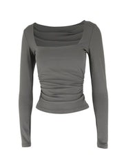 Gray long sleeve slim fit t-shirt with square neckline and ruched side detail.