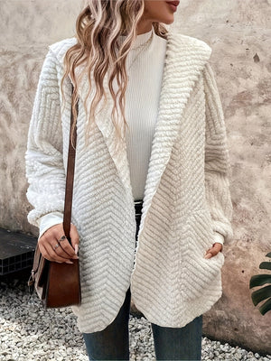 Ivory textured chevron hooded cocoon coat with open front and pockets.