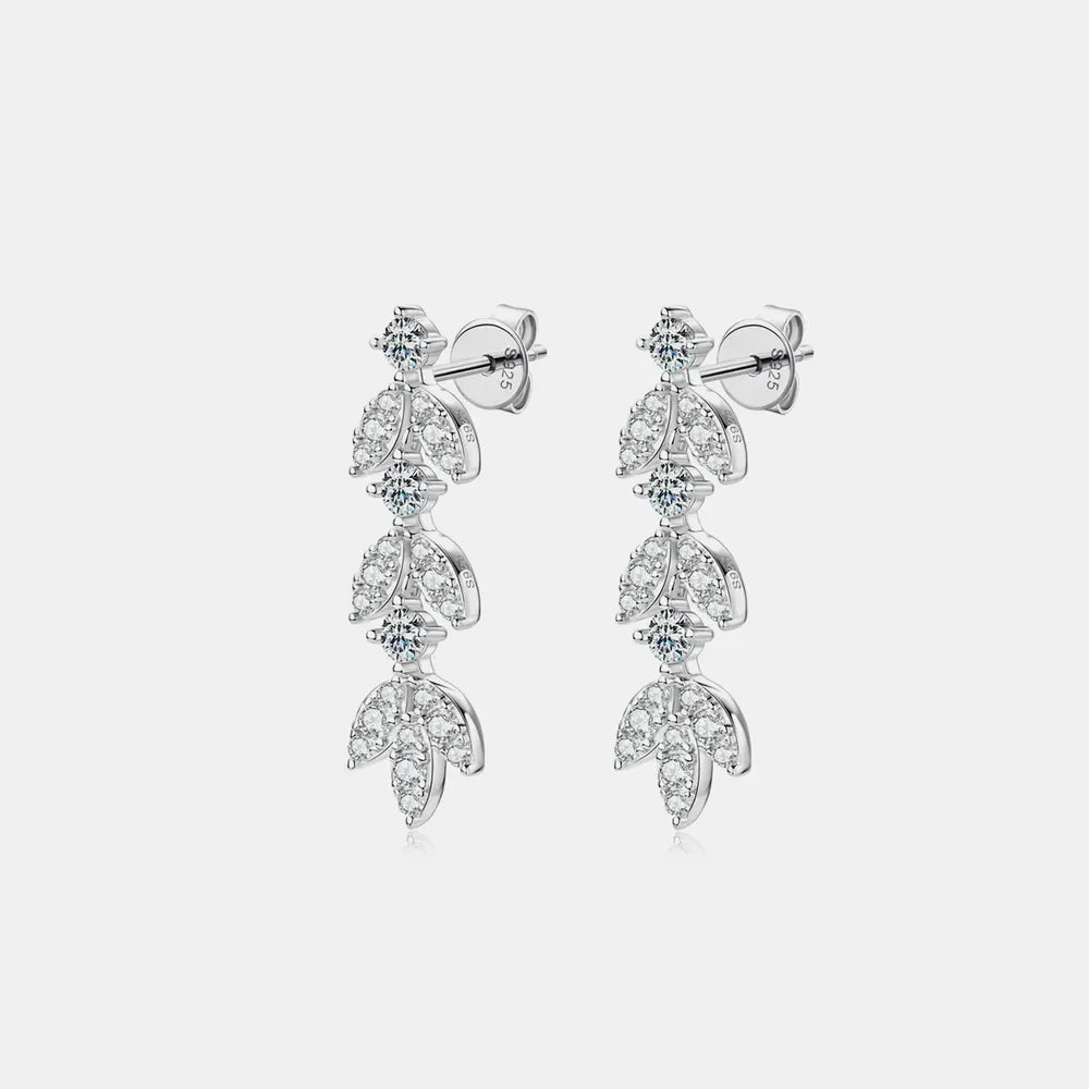 Silver botanical drop earrings with cubic zirconia accents.