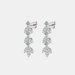 Silver botanical drop earrings with cubic zirconia accents.