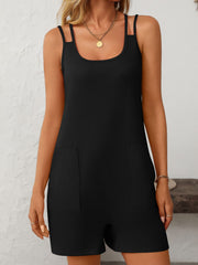 Black strappy back pocket romper with scoop neck and dual shoulder straps.