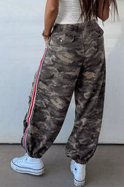Camo print relaxed fit maternity pants in Army Green with red and white side stripes and drawstring waist.