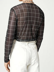 Black grid-print sheer mesh long sleeve top with a crew neck.