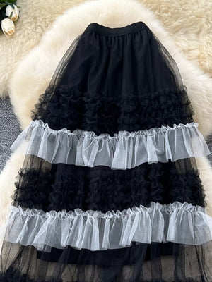 Black tulle skirt with tiered ruffles and white trim detail