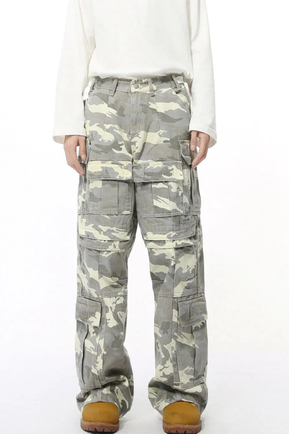 Oversized camo utility trousers in gray with multiple cargo pockets.