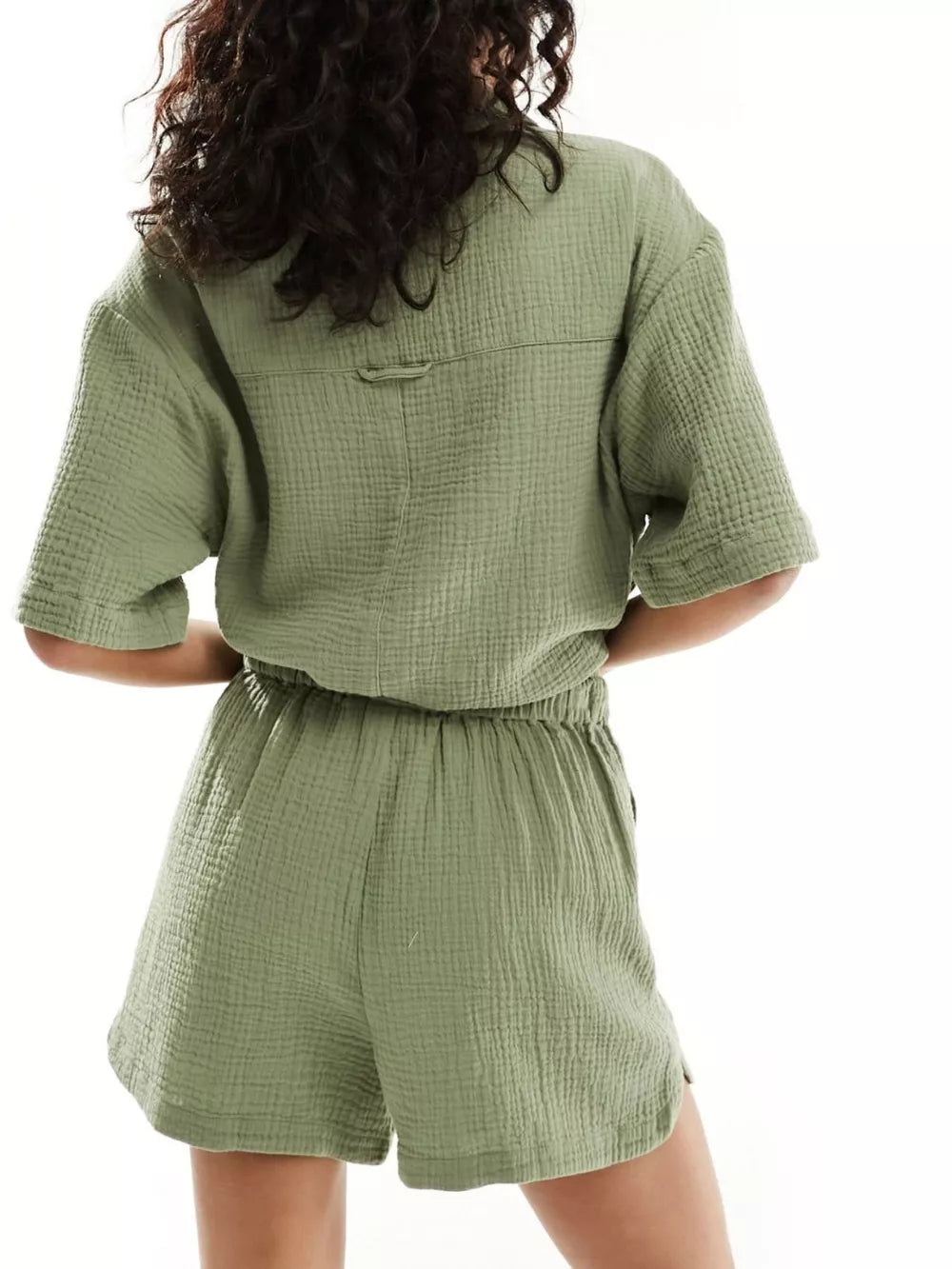 Army green crinkle cotton two-piece pajama set with short sleeves and elastic waist shorts.