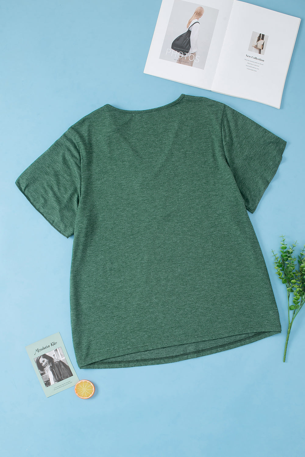 Dark green heather tee with flutter sleeves and lace trim detail