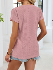 Blush pink eyelet tee with petal sleeves and V-neck, casual women's top.