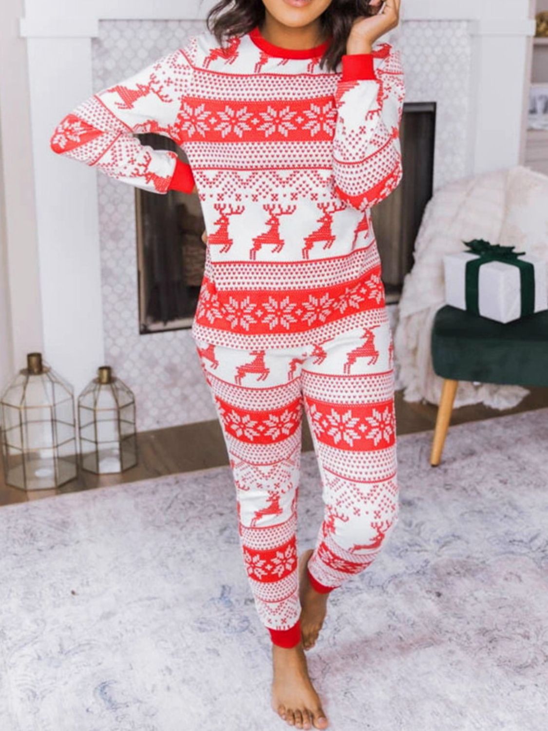 Festive reindeer knit lounge set in orange-red with snowflake pattern.