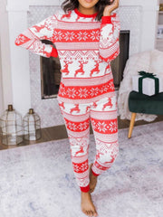 Festive reindeer knit lounge set in orange-red with snowflake pattern.