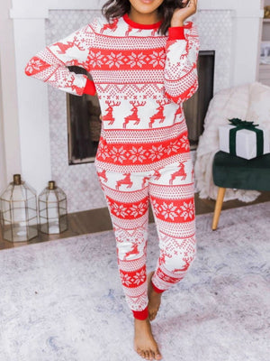 Festive reindeer knit lounge set in orange-red with snowflake pattern.