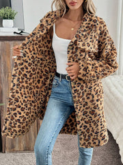 Leopard print shaggy button-down duster coat with a relaxed fit and two chest pockets.