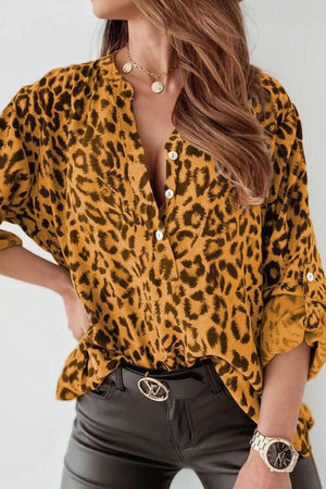 Mustard leopard print henley blouse with rolled sleeves and button detail