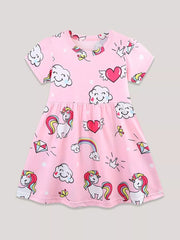 Pink short sleeve toddler dress with unicorn, cloud, rainbow, and heart prints.