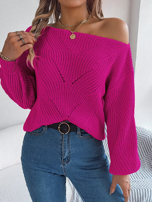 Off-the-shoulder knit sweater in cerise with openwork detail and long sleeves