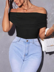 Black off-shoulder ruched t-shirt with short sleeves, styled with light wash jeans.