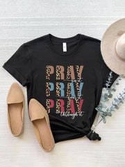 Black graphic t-shirt with leopard print and text detail.
