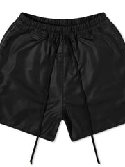 Black nylon drawstring shorts with curved hem detail and elastic waistband.