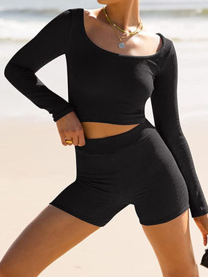 Black ribbed knit scoop neck crop top and high-waisted shorts set