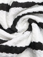 Black and white striped knit midi dress fabric detail