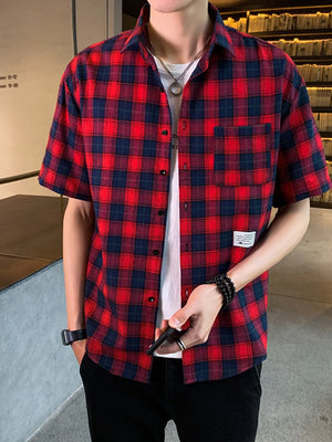 Red and navy plaid short sleeve button-down shirt with chest pocket