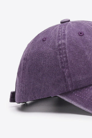 Washed cotton baseball cap in purple with distressed detail