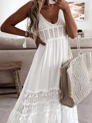 White crochet cami dress with lace and tassel trim detailing.