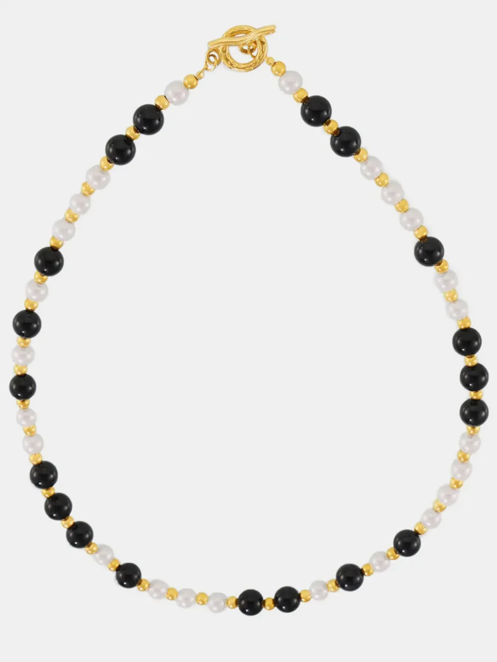 Gold toggle necklace with black onyx and white pearl beads