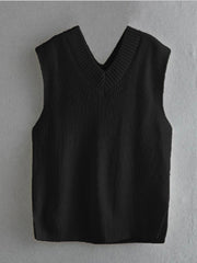 Black textured knit vest with V-neck and asymmetric hem