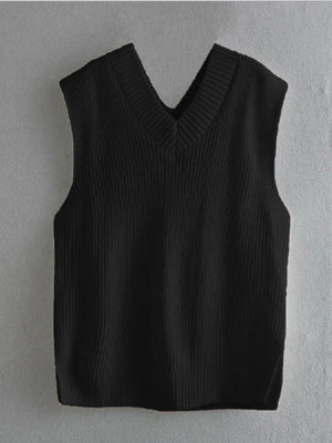 Black textured knit vest with V-neck and asymmetric hem