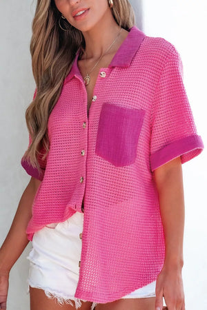 Pink waffle-knit button-down shirt with short sleeves and a chest pocket.