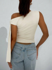 Apricot asymmetrical tie detail cropped blouse with one shoulder and draped sleeve.